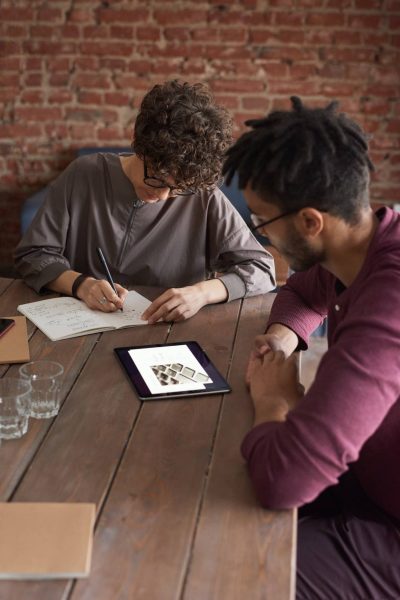 man-wearing-purple-long-sleeved-shirt-looking-at-the-ipad-3184326.jpg